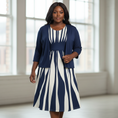 Load image into Gallery viewer, Black plus-sized model in dark blue geometric print