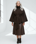 Load image into Gallery viewer, Obviously plus-sized older model in winter high neck batwing sleeve coat