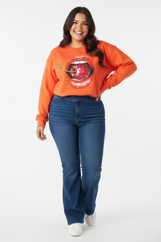 Latina woman in disco cherry sweatshirt and jeans