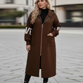 Load image into Gallery viewer, Plus-sized model in hooded windbreaker trench coat
