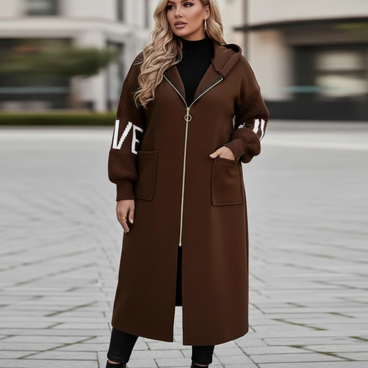 Plus-sized model in hooded windbreaker trench coat